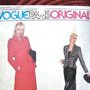 May include: A vintage Vogue Paris Original sewing pattern for a Givenchy design. The pattern features two women's outfits, one in red and one in black and white.