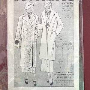 May include: Vintage Butterick sewing pattern packet featuring illustrations of women's coats and a two-piece suit. The packet includes the text "PATTERN INCLUDING THE NEW DELTOR" and "TWO-PIECE SUIT FOR SHORTER WOMEN OF LARGER HIP". The packet is sealed in clear plastic.