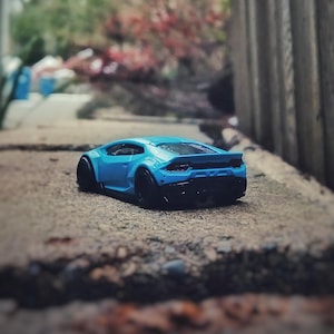Custom 1/64 Diecast car in sky blue made from LBWK Hotwheels Lamborghini Huracán Premium (metal base)
