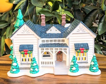Dept 56 Grandma&#39;s Cottage 54208 Snow Village -Christmas Trees in front yard-Ceramic- house with porch-Christmas House-White and Blue House
