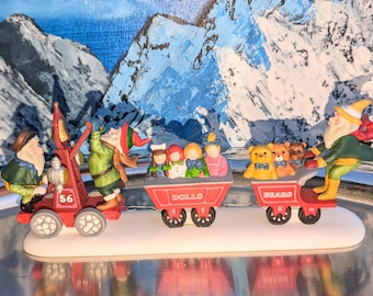 Dept 56 North Pole Last Minute Delivery-Heritage Village Collection Porcelain Elves-56367-Elves and Toys-Teddy Bears-Dolls-Christmas Village