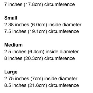 May include: A chart showing the different sizes of a bangle, with measurements in inches and centimeters. The bangle comes in five sizes: Extra Small, Small, Medium, Large, and Extra Large.