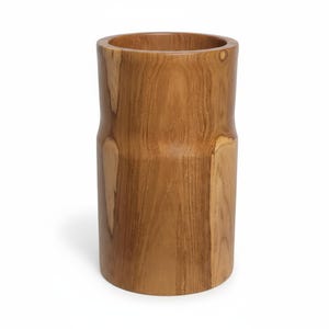May include: A cylindrical wooden vase with a light brown finish. The vase has a wide opening and a slightly indented middle section. The wood grain is visible, adding texture to the design. The vase is suitable for holding flowers or as a decorative item.