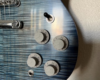 custom 3d printed guitar knobs. and yes they go to 11 of course.