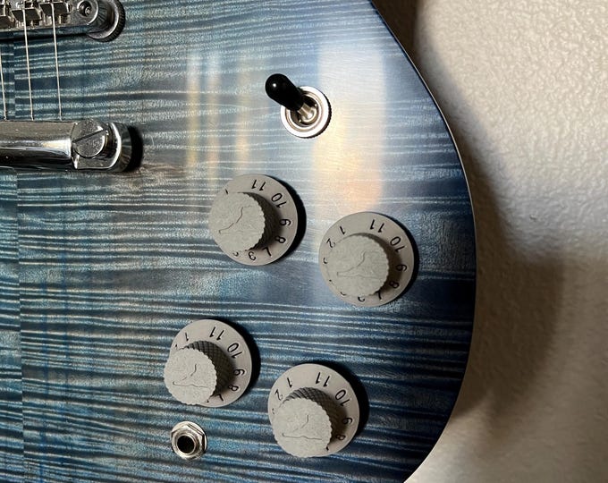 custom 3d printed guitar knobs. and yes they go to 11 of course.