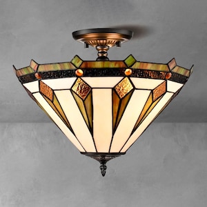 May include: A semi-flush mount ceiling light fixture featuring a conical stained glass shade with geometric panels in cream, amber, and green tones. The fixture includes a dark bronze metal canopy and a decorative finial at the bottom point.