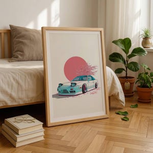 Peut inclure: Une impression d'art encadrée représentant une voiture de sport blanche avec des phares escamotables et des accents bleu sarcelle, placée devant un grand cercle rose et un cerisier en fleurs. L'illustration présente un style épuré et doux.