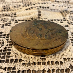Vintage brass makeup compact