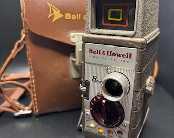 Bell and Howell/canon 45 Mm Camera With Original Leather Case
