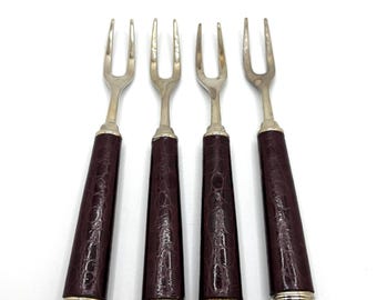 Set vintage di forchette da cocktail con manici in pelle