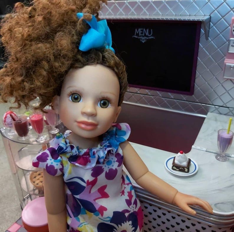 HerStory Dolls 18" articulated Black doll line reflecting diversity within girls of African decsent. Created this with my daughter in mind.