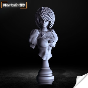 May include: A 3D-printed bust of a female character with short, layered hair and a blindfold. The bust is light gray and features a detailed design of the character's outfit. The base is a stylized pedestal. The text "Mortalix3D" is in the upper left corner.