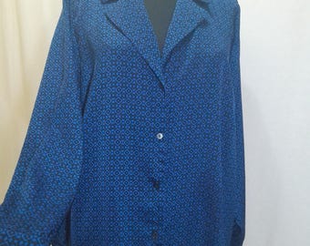Camicetta oversize a maniche lunghe con motivo geometrico blu, stile vintage anni '80.