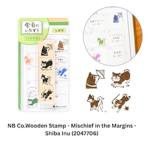 May include: A set of four small wooden stamps featuring Shiba Inu dog illustrations on a rectangular backing card. The packaging includes Japanese text and a circular inset showing the stamps used on a calendar grid. The stamps depict various Shiba Inu poses.