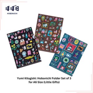 May include: Set of three colorful A6-sized folders featuring illustrations of animals and objects. The folders are designed by Yumi Kitagishi for Hobonichi.