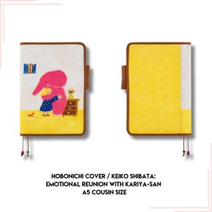 May include: A Hobonichi cover featuring an illustration of an elephant hugging a smaller figure. The cover is a light brown color with a yellow background and a brown border. The text "HOBONICHI COVER / KEIKO SHIBATA: EMOTIONAL REUNION WITH KARIYA-SAN A5 COUSIN SIZE" is printed on the bottom of the image.