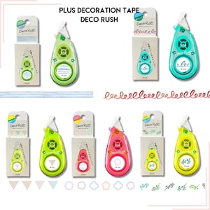 May include: Assortment of Deco Rush Plus decoration tapes. The tapes come in a variety of colours, including green, blue, yellow, pink, and red. Each tape features a different design, including waves, triangles, flowers, and leaves. The tapes are packaged in clear plastic containers with the Deco Rush logo and the word "Plus".