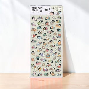 May include: A rectangular sheet of Mind Wave Seals stickers featuring numerous small, colorful illustrations of people in various relaxed poses, including lounging, reading, and sleeping, set against a pale green background with Japanese text.