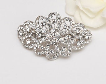 Silver metal, flower, swirls hair barrette, clear crystal and rhinestone flower and swirls hairpiece