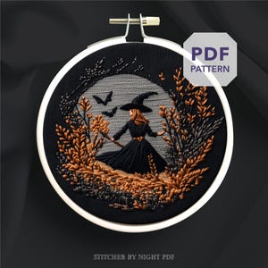 May include: An embroidered hoop art piece featuring a witch in a black dress and hat, holding a broom. The design includes bats, autumn foliage, and the text "PDF PATTERN". The embroidery is set against a black background.