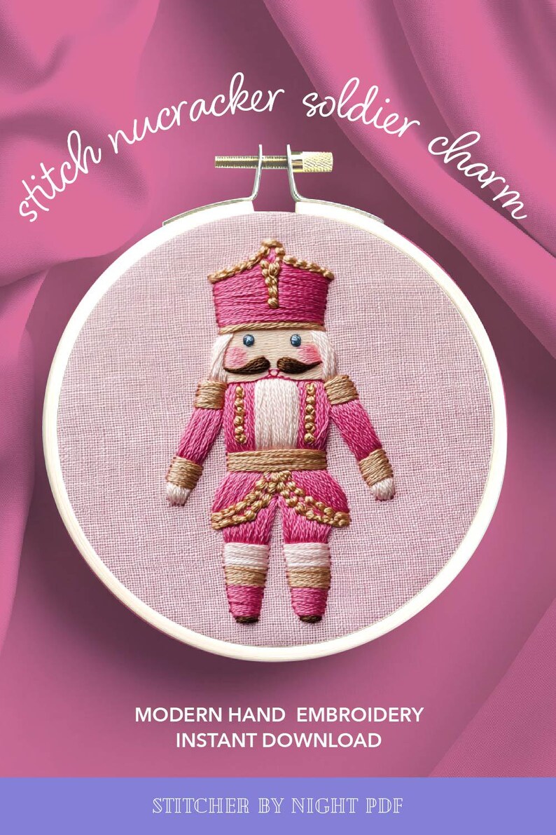 May include: An embroidery hoop featuring a pink and gold embroidered nutcracker soldier. The soldier has a pink uniform, a white beard, and a mustache. The text "stitch nucracker soldier charm" is arched above the hoop. The text "MODERN HAND EMBROIDERY INSTANT DOWNLOAD" is below the hoop.