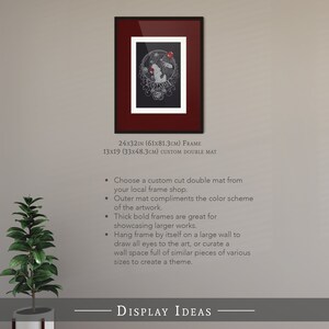 May include: A black and white illustration of a woman with a red rose in her hair. The illustration is framed in a black frame with a red mat. The frame is 24x32 inches (61x81.3 cm) and the mat is 13x19 inches (33x48.3 cm). The image is titled "The Realm of Sam" and is available on Etsy.