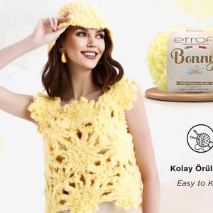 Puede incluir: Un top y un gorro de crochet amarillo hechos con un hilo suave y esponjoso llamado "Bonny" de Etrofil. El hilo es fácil de tejer y viene en un ovillo de 100 gramos.