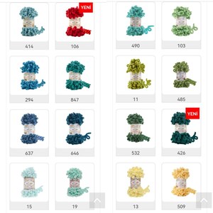 May include: Assortment of yarn spools in various colors, including teal, red, green, blue, and yellow. The spools are labeled with numbers, and some have the word "Yeni" printed on them.