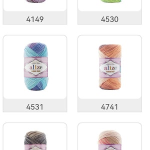 May include: Six skeins of Alize Cotton Gold yarn in various colors. The skeins are labeled with color codes. Colors include purple, green, blue, orange, brown, and pink. Each skein has a label with the brand name and yarn type.