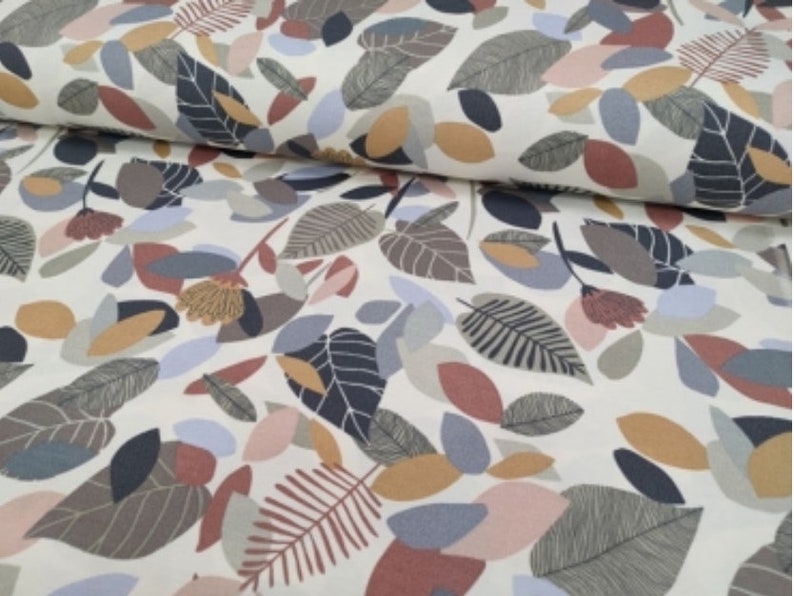 May include: White fabric with a repeating pattern of stylized leaves in shades of brown, gray, blue, pink, and beige.