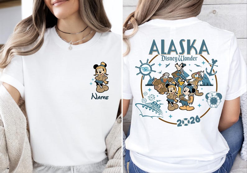 A woman wearing a white t-shirt with a Disney-themed design on the back.