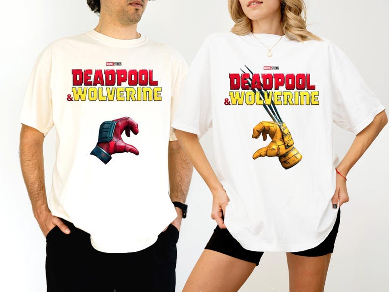 a man and a woman wearing deadpool and wolverine t - shirts