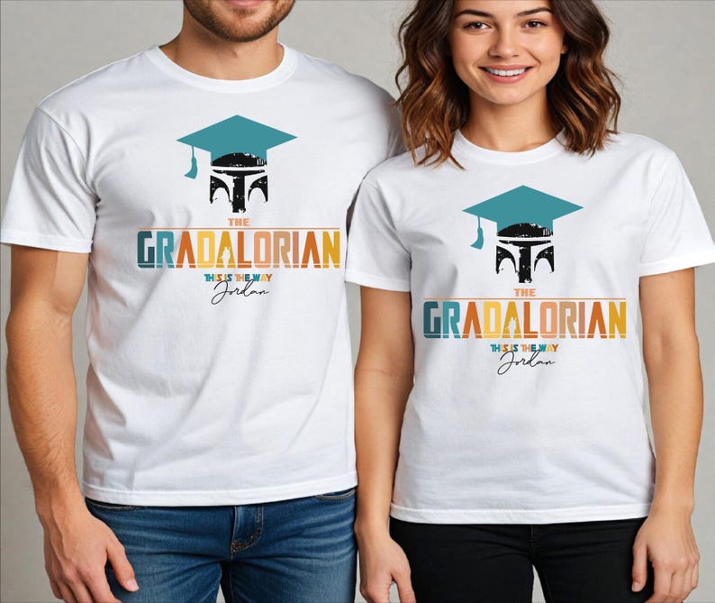 a man and a woman wearing white graduation shirts