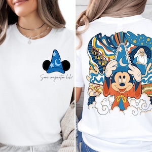 a woman wearing a mickey mouse t - shirt