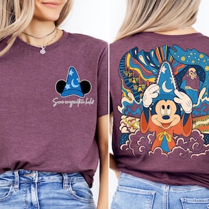 a woman wearing a purple shirt with mickey mouse on it