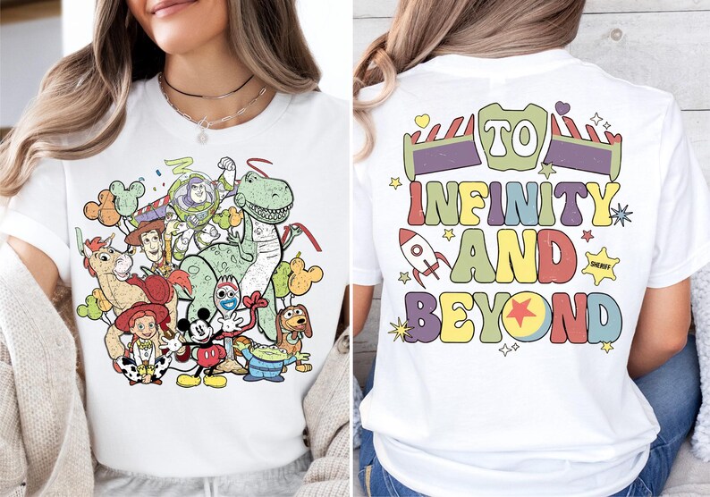 a woman sitting on a couch wearing a white shirt with cartoon characters on it