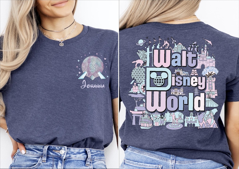 A woman wearing a gray t-shirt with a graphic design featuring Disney World and the text "Walt Disney World" printed on it.