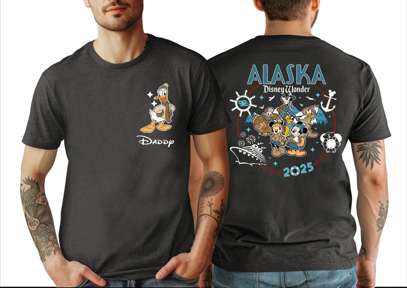 A man wearing a black t-shirt with a graphic design featuring Disney characters and text related to Alaska.