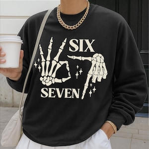 6 7 Skeleton Hand Shirt, Halloween Skeleton Shirt, Six Seven Funny Meme Shirt, 67 Trendy Halloween Sweater, Halloween Gen Z 6 7 Shirt
