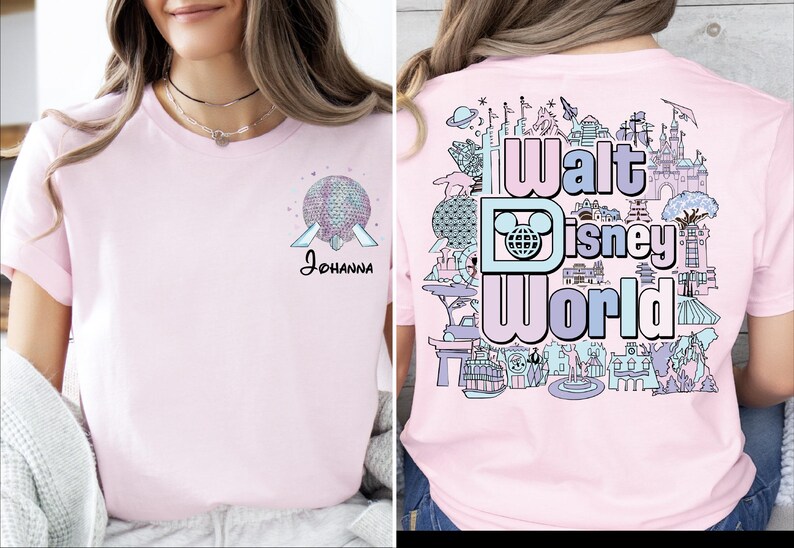 A woman wearing a pink t-shirt with a Disney World logo and various Disney-themed illustrations on the back.