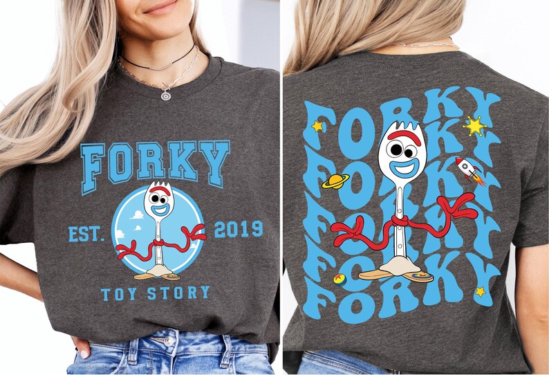 a woman wearing a forky tshirt and jeans