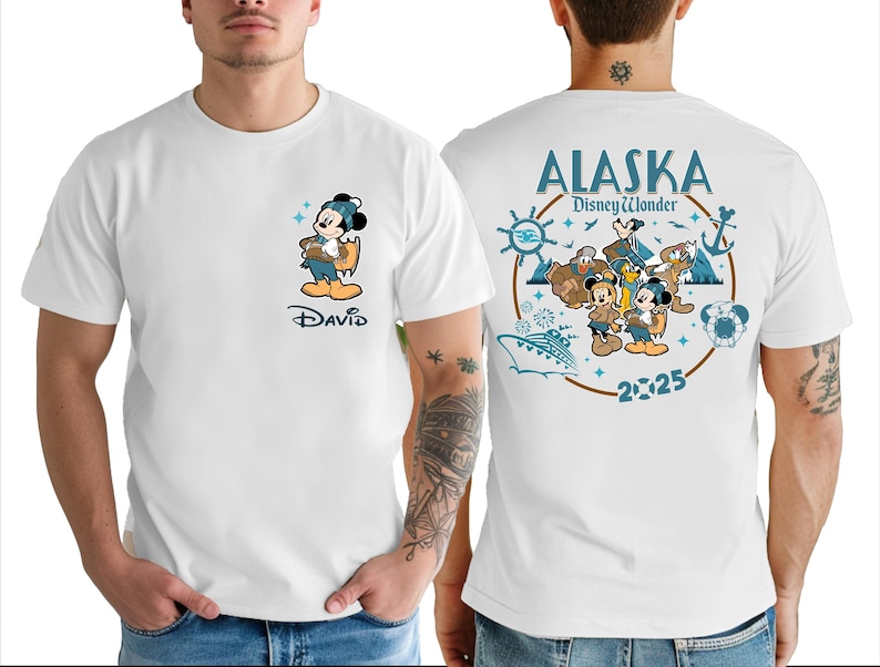 A white t-shirt with a graphic design featuring a cartoon character and various Disney-themed elements, along with the text "Alaska Disney Wonder" and the year "2025".