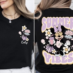 a woman wearing a black shirt that says summer vibes