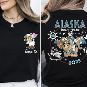 The image is a collage of two photos. The left photo shows a woman wearing a black t-shirt with a Disney character and the text "Sophia" printed on it. The right photo shows the back of a black t-shirt with the text "Alaska Disney Wonder" and the year "2025" printed on it.