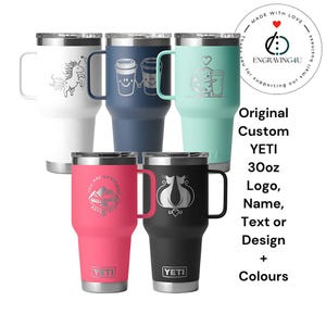 May include: A collection of six 30oz Yeti tumblers in various colors, each with a handle and a silver lid. The tumblers are white, navy blue, mint green, pink, and black. Each tumbler has a unique engraved design, including a unicorn, coffee cups, and a mountain scene.
