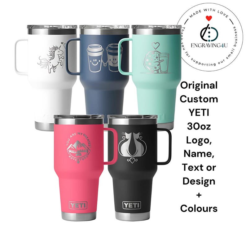 May include: A collection of six 30oz Yeti tumblers in various colors, each with a handle and a silver lid. The tumblers are white, navy blue, mint green, pink, and black. Each tumbler has a unique engraved design, including a unicorn, coffee cups, and a mountain scene.