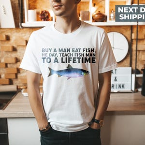 Fish Man To A Lifetime Funny Meme Shirt, Buy a Man Eat Fish, He Day Teach, Fishing Humor Gift, Funny Shirt for Fishing Lovers, Fisherman Tee