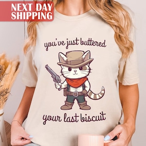 Camiseta &quot;Acabas de untar con mantequilla tu última galleta&quot;, divertida camiseta de gato vaquero, camiseta de compañero maullador, camiseta de último haw, regalo para dueños de gatos, camiseta vintage