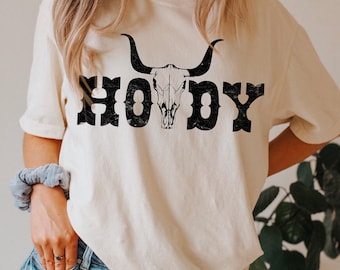 Koszulka Comfort Colors®, koszulka Howdy, koszula w stylu boho kowbojskim, koszula vintage z czaszką byka, koszulka z grafiką w stylu western, urocze koszule w stylu western, koszula kowbojka