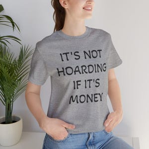 お金を溜め込むのではない、コインコレクターTシャツ、面白い収集Tシャツ、ユニセックス半袖シャツ、コレクターが溜め込むのではない、デザインが面白いTシャツ